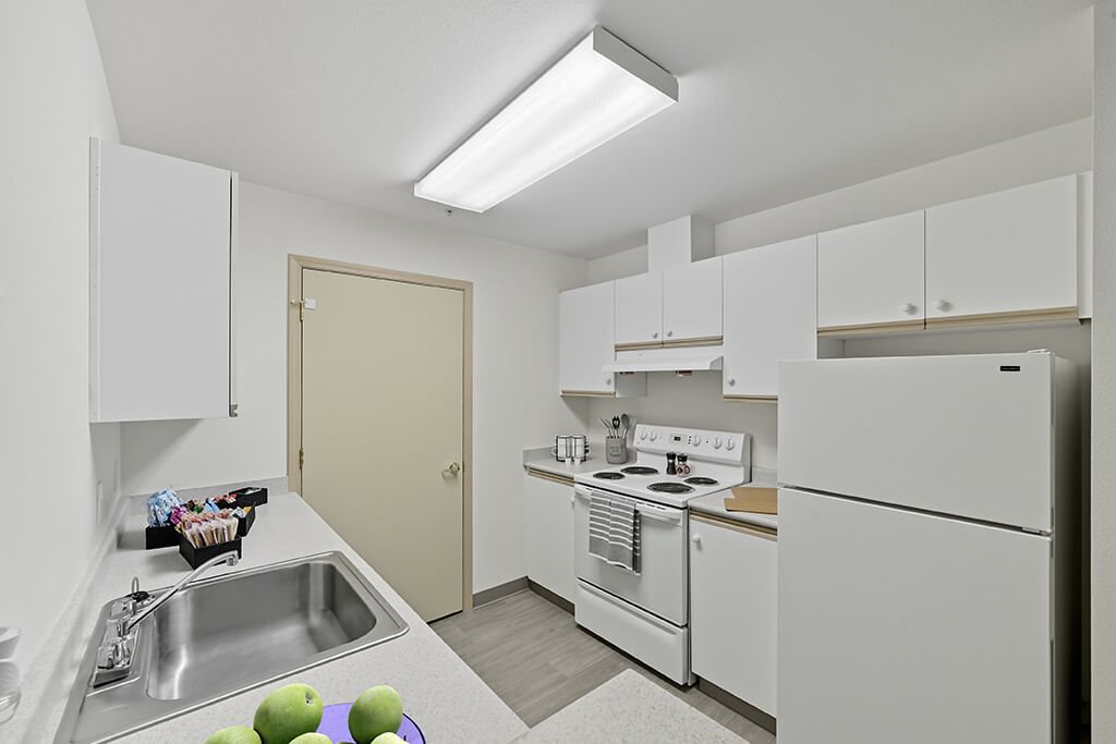 Kitchen with appliances at Alderwood Court in Lynnwood WA